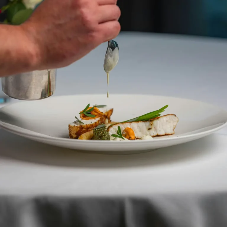 Fine-dining plate with fish and vegetables