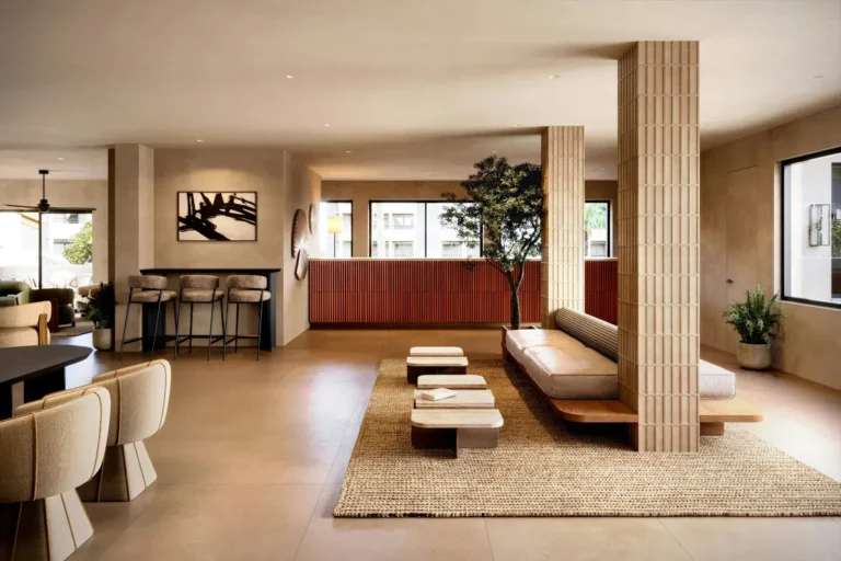 Modern hotel lobby with lounge seating and reception desk