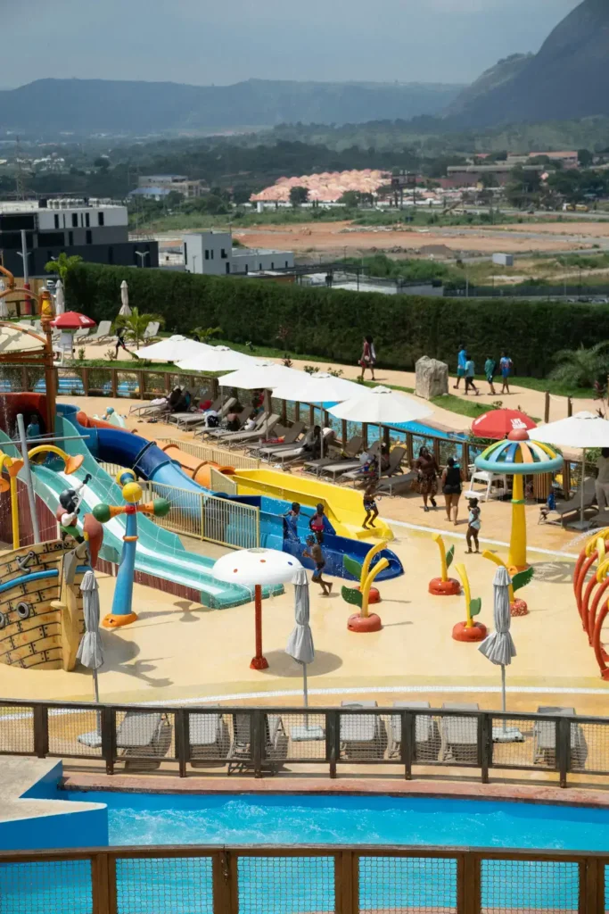 Resort splash park for kids with slides and parasols