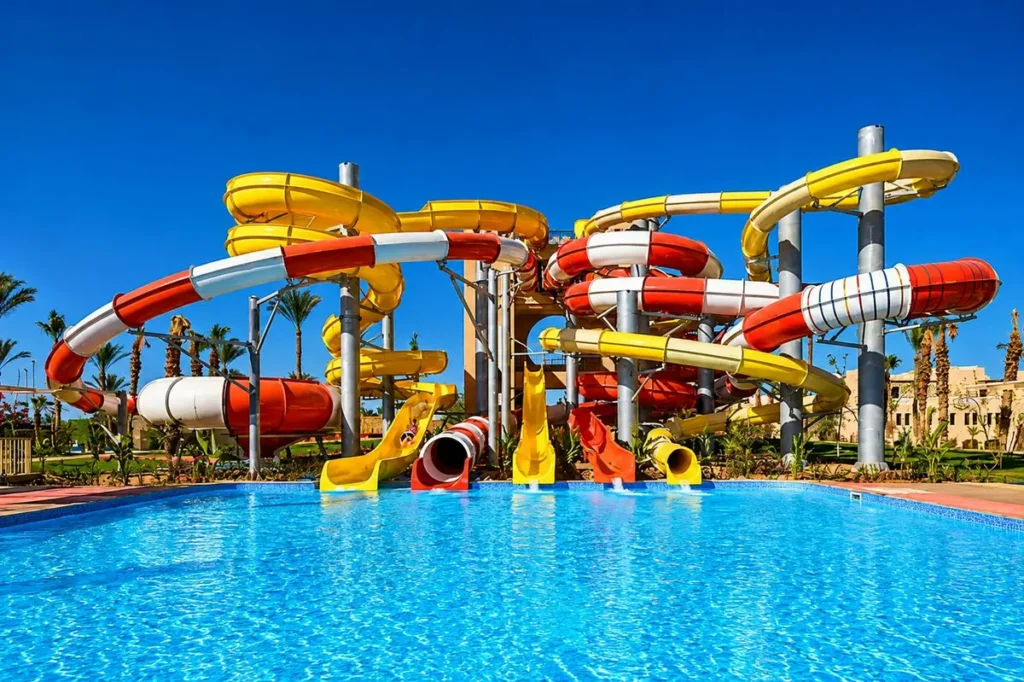 Colorful water slides above a blue pool