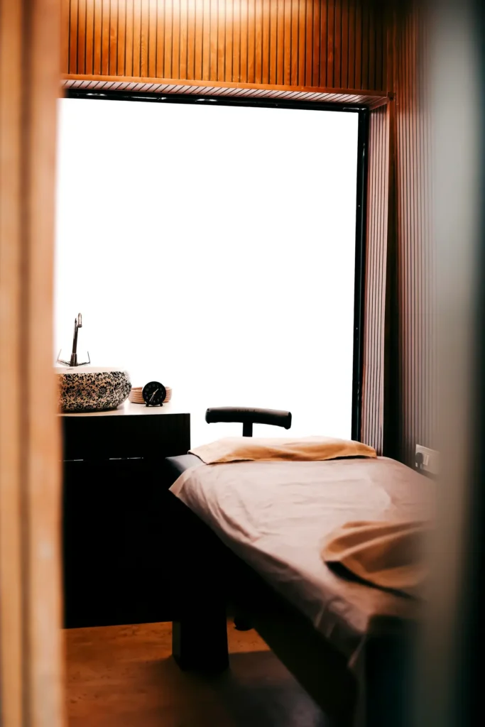 Spa treatment room with a massage table